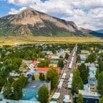 Crested Butte real estate - Property management services. Aerial image of Elk Avenue in the summer time.